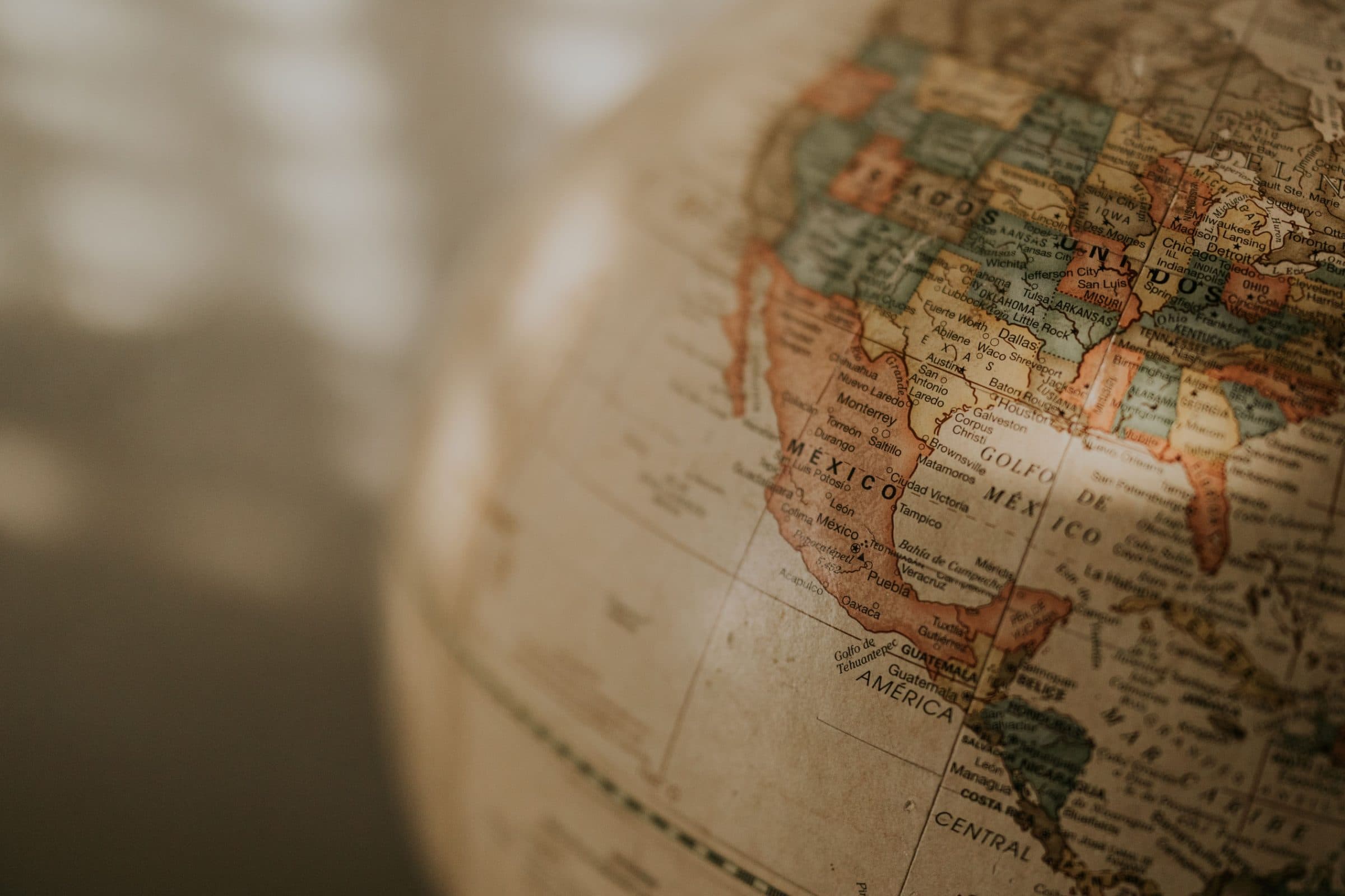 Vintage world map, representing cross-border tax and regulatory compliance